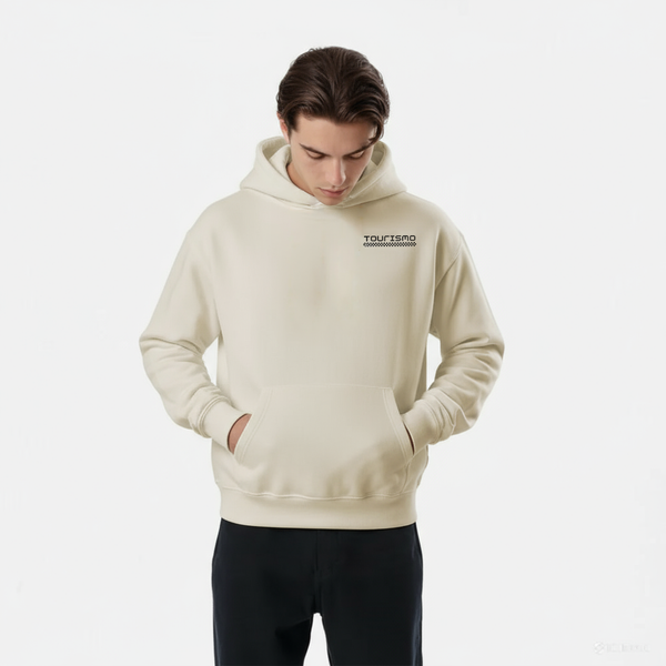 Homme en hoodie crème clair TOURISMO regardant vers le bas, fond blanc