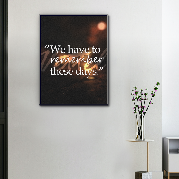 Toile citation Vettel “We Have to Remember These Days” accrochée dans un intérieur moderne avec cadre noir