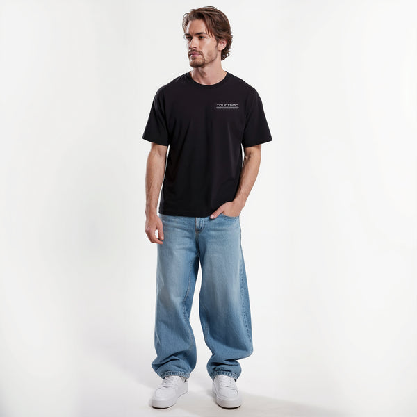 T-shirt noir Wrangler 4XE, logo sur la poitrine, mannequin de face