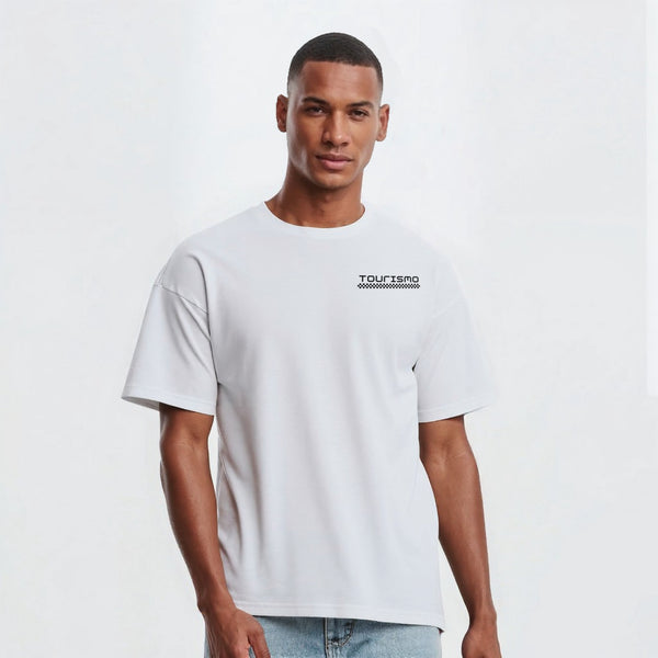 T-shirt blanc Lando Norris Signature Edition, vue de face en pied sur mannequin en jean clair et baskets blanches