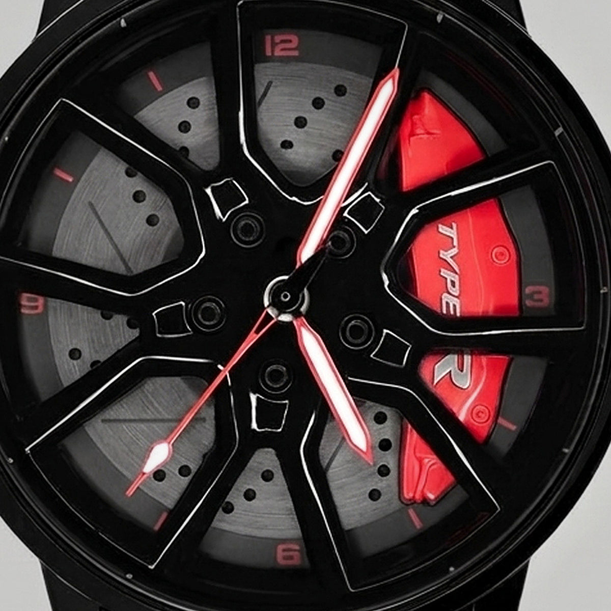 Nahaufnahme der Felge und des gravierten Bremssattels TYPE R, Honda Type R Uhr