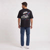 T-shirt Lancia Delta Integrale noir porté de dos en plan large